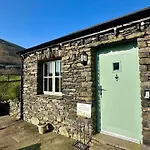 Oak Tree Nestled In The Hills Of The District And Yorkshire Dales Tebay (Cumbria)