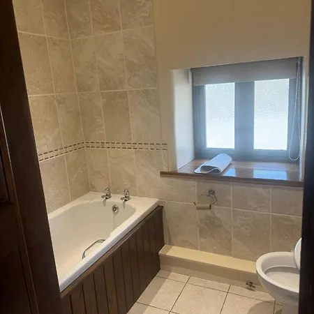 Oak Tree Nestled In The Hills Of The District And Yorkshire Dales *