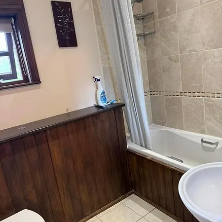 Oak Tree Nestled In The Hills Of The District And Yorkshire Dales *